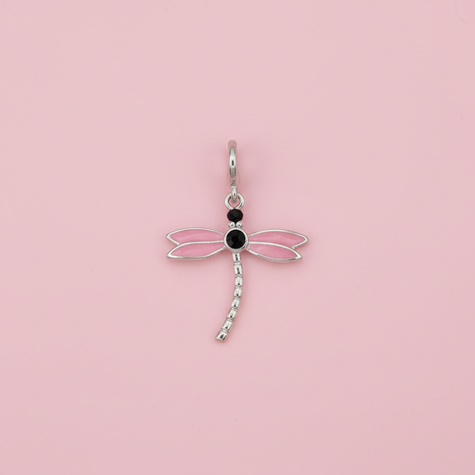 Dragonfly charm with pink background