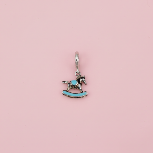 Rocking horse charm - pink background